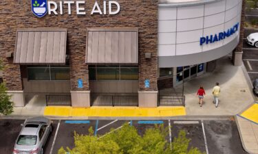 Customers enter a Rite Aid store in California.  Rite Aid announced it is filing for bankruptcy for a second time on May 5.