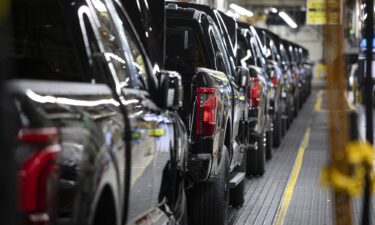 New Ford F-150 trucks go through the assembly line at the Ford Dearborn Plant. Ford says that auto tariffs will cost the company $1.5 billion this year.